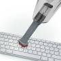 Severin Akku-Handstaubsauger HV 7144 beim Reinigen einer Computertastatur.