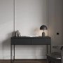Moderner schwarzer Selsey Bemmi Schminktisch mit zwei Schubladen und schlanken Metallbeinen.