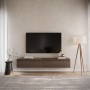 Selsey TV-Hängeboard Bemmi 175 cm in Nussbaum-Holzoptik, schwebend unter einem Fernseher im modernen Wohnzimmer.
