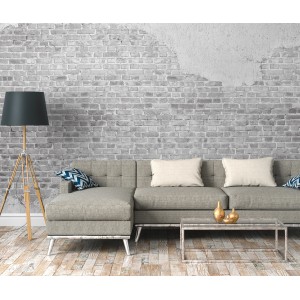 Fototapete Steinwand Klinker Putz Industrial Weiß im Wohnraum mit Sofa und Lampe.