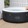 Bestway Lay-Z-Spa Miami AirJet: Aufblasbarer, runder Whirlpool in Schwarz mit Filterpumpe und entspannender Person.