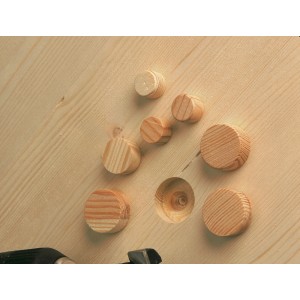 LUX Ausbesserungsplättchen aus Holz in 15, 20 und 25 mm auf Holzoberfläche.