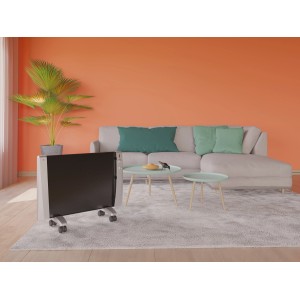 Grau-schwarzer Infrarot Wärmewellenheizer Taulo 1500 W im Wohnraum mit Sofa und Teppich.