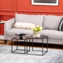 Modernes 2er-Set schwarzer, eckiger Couchtische mit Stahlgestell als Satztische. Im Wohnzimmer neben Sofa, für Deko.