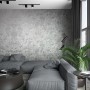 Wohnraum mit grauer Marburg Vliestapete Struktur Modern Grau-Silber FSC® an der Wand.