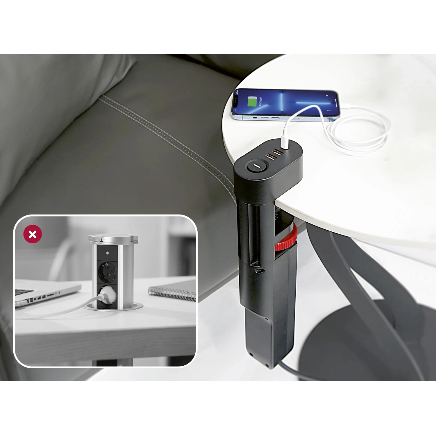 Schwarze 3-fach Steckdosenleiste mit USB-Anschlüssen am Tisch mit Smartphone.