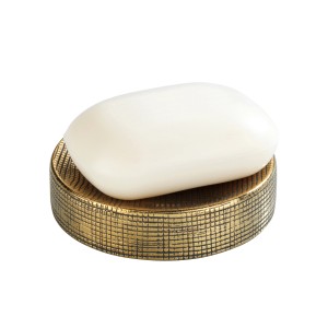 Wenko Seifenablage Rivara aus Keramik in Gold mit Seife.