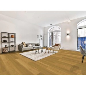 Klebe-Vinylboden Jacopo Oak in Eichenoptik mit langen, breiten Dielen in modernem Wohnzimmer. Warme Holzmaserung.