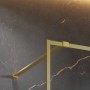 Detailansicht: Schulte Duschwand Walk In Trend 2.0 mit Goldoptik und Stabilisationsarm.