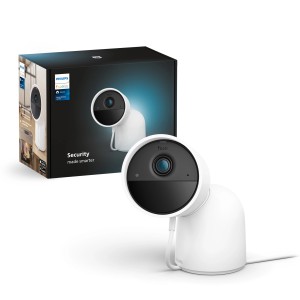 Weiße Philips Hue Secure Kamera mit Standfuß und Verpackung. Kabelgebundene Kamera für die Videoüberwachung.