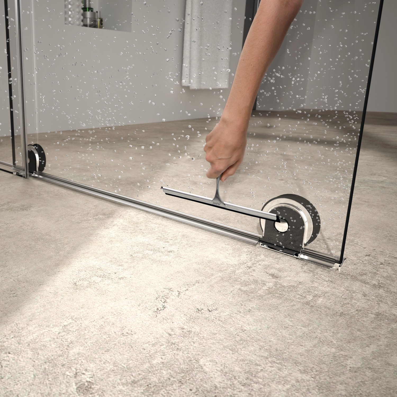 Detailaufnahme: Hüppe Xtensa Pure Walk-In Dusche mit Gleittür, silberne Profile, Reinigung mit Abzieher.