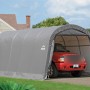 Graue ShelterLogic Zeltgarage 610x370x240 cm mit rotem Auto. Ideal als Fertiggarage oder Unterstand.
