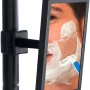 Detailaufnahme: Wenko Duschregal Premium Big Black mit Spiegel beim Rasieren.
