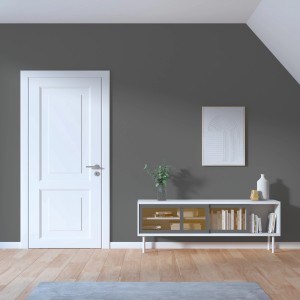 Wohnraum mit schiefergrauer Wandfarbe von CREATE! by OBI, kombiniert mit weißen Möbeln und Holzboden.