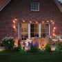 Paulmann Plug & Shine Basket: Lichtobjekt im Garten mit warmweißem Licht und Rattan-Look.