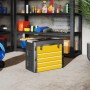 Gelbe HOMCOM Werkzeugkiste aus Stahl und Kunststoff mit 4 Schubladen und Tragegriff in einer Garage.