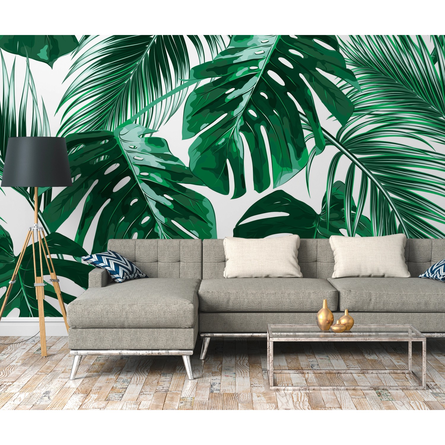 Fototapete mit Palmen- und Monstera-Blättern in Grün und Weiß hinter einem Wohnbereich.