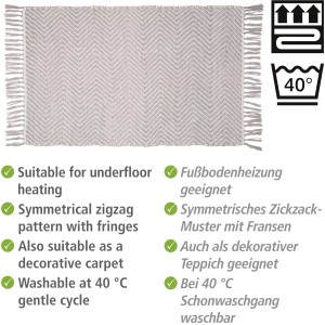 Wenko Badematte Gata, grau-weißer Badteppich mit Zickzackmuster und Fransen, 50x80 cm.