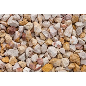 Nahaufnahme von Kalksteinsplitt Juli-Bunt, Körnung 22-32 mm, ideal für Garten- und Landschaftsbau.