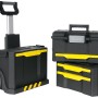 Stanley Werkstattwagen, rollend und modular aufgebaut, mit Werkzeugboxen und Schubladen in Schwarz/Gelb.