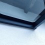 Detailansicht: Anthrazitfarbene Terrassenüberdachung Terracon Smartline an einer Hauswand.