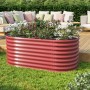 Rotes Vitavia Hochbeet 630 Vita Basic Rubin im Garten mit Bepflanzung.