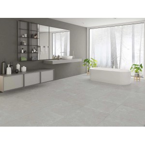 Badezimmer mit grauen, matten 60x60 Feinsteinzeug Bodenfliesen in Steinoptik.