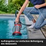 Einhell GE-DP 7535 N LL Eco Flutset im Einsatz: Frau senkt Pumpe mit Seil in Pool.