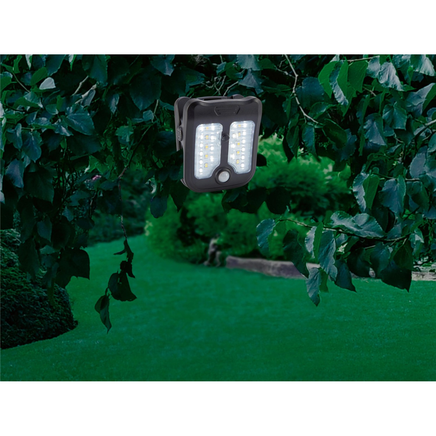 Schwarze Solar LED Gartenleuchte mit Clip-on an einem Ast befestigt.