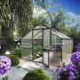 KGT Gewächshaus Orchidee, anthrazitgrau, 12,74 m², mit geöffneter Tür im Garten.