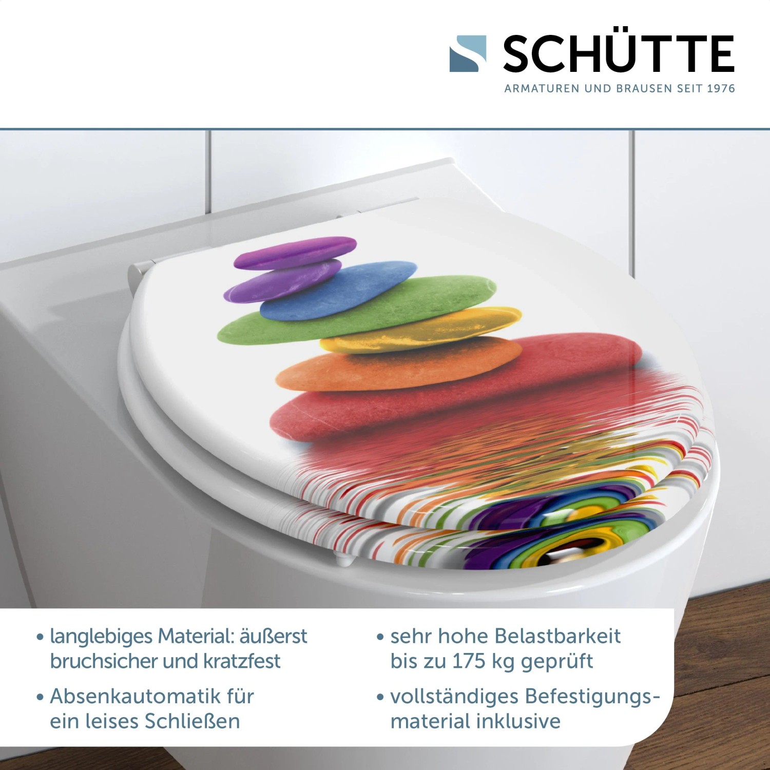 Schütte WC-Sitz Colorful Stones mit Absenkautomatik auf WC-Becken, Motiv Steine in Regenbogenfarben.