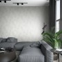 Wohnraum mit Marburg Vliestapete Struktur Modern Greige FSC® an der Wand.