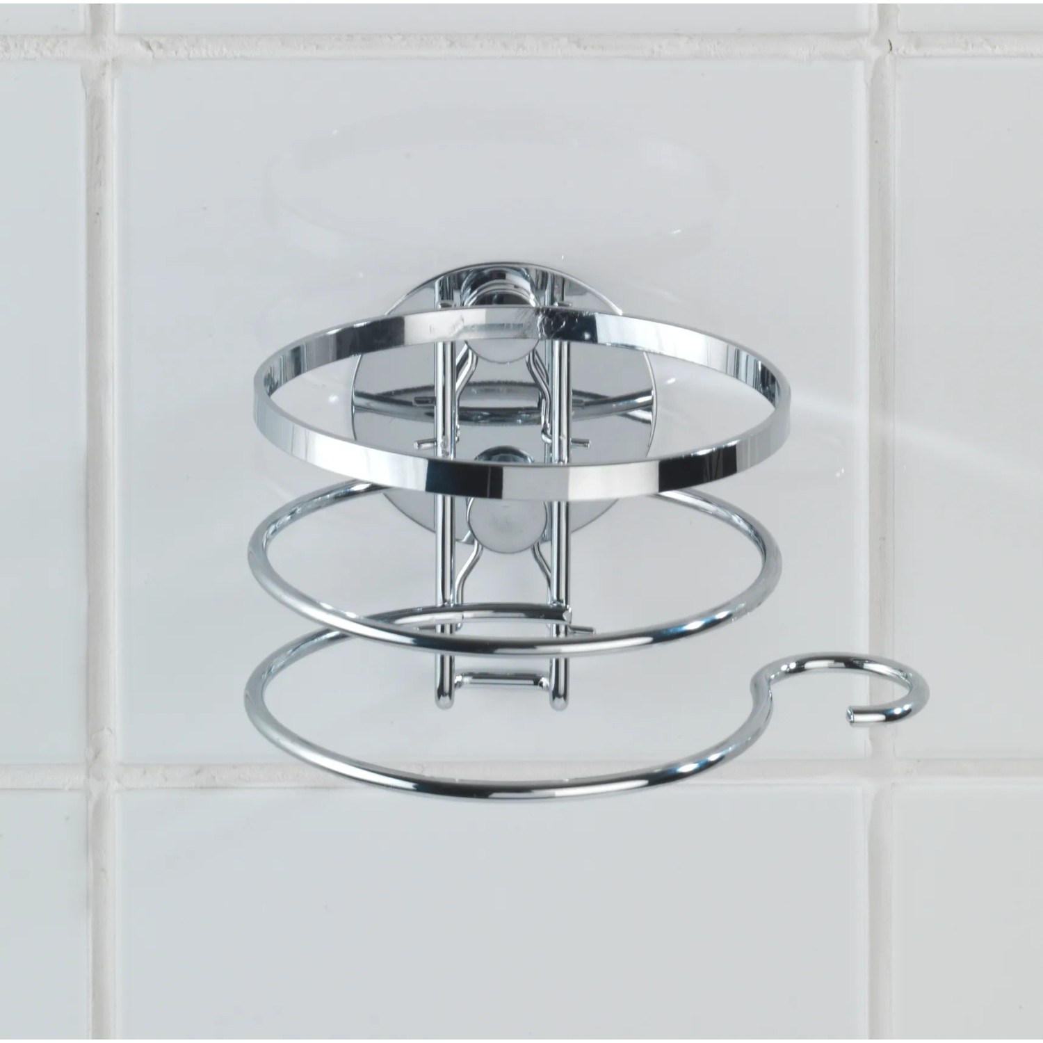 Wenko Turbo-Loc Haartrocknerhalter aus glänzendem Edelstahl an weißer Wand.