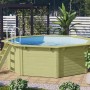 Karibu Holzpool Modell 1 Set mit Filteranlage und Leiter im Garten.