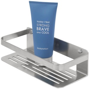 Tiger Duschkorb Caddy aus gebürstetem Edelstahl mit blauer Lotion.