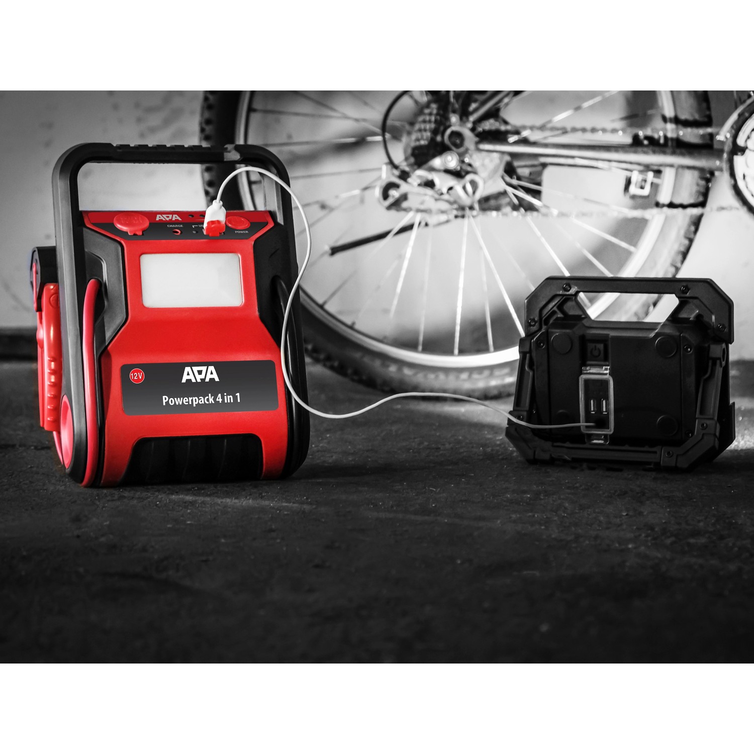 APA Starthilfe Powerpack 300 A mit Kompressor, rot/schwarz, mit USB-Anschluss und Arbeitsleuchte.
