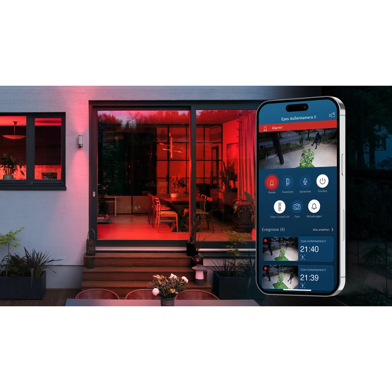 Bosch Smart Home Eyes II Außenkamera in Silber mit Smartphone-App im Einsatz.