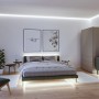 Schlafzimmer mit indirekter Beleuchtung durch Paulmann LED-Strip MaxLED 1000 COB an Decke und Bett.