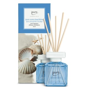 ipuro Essentials Raumduft Sunny Beachtime 50ml mit Duftstäbchen und Verpackung mit Strandmotiv.