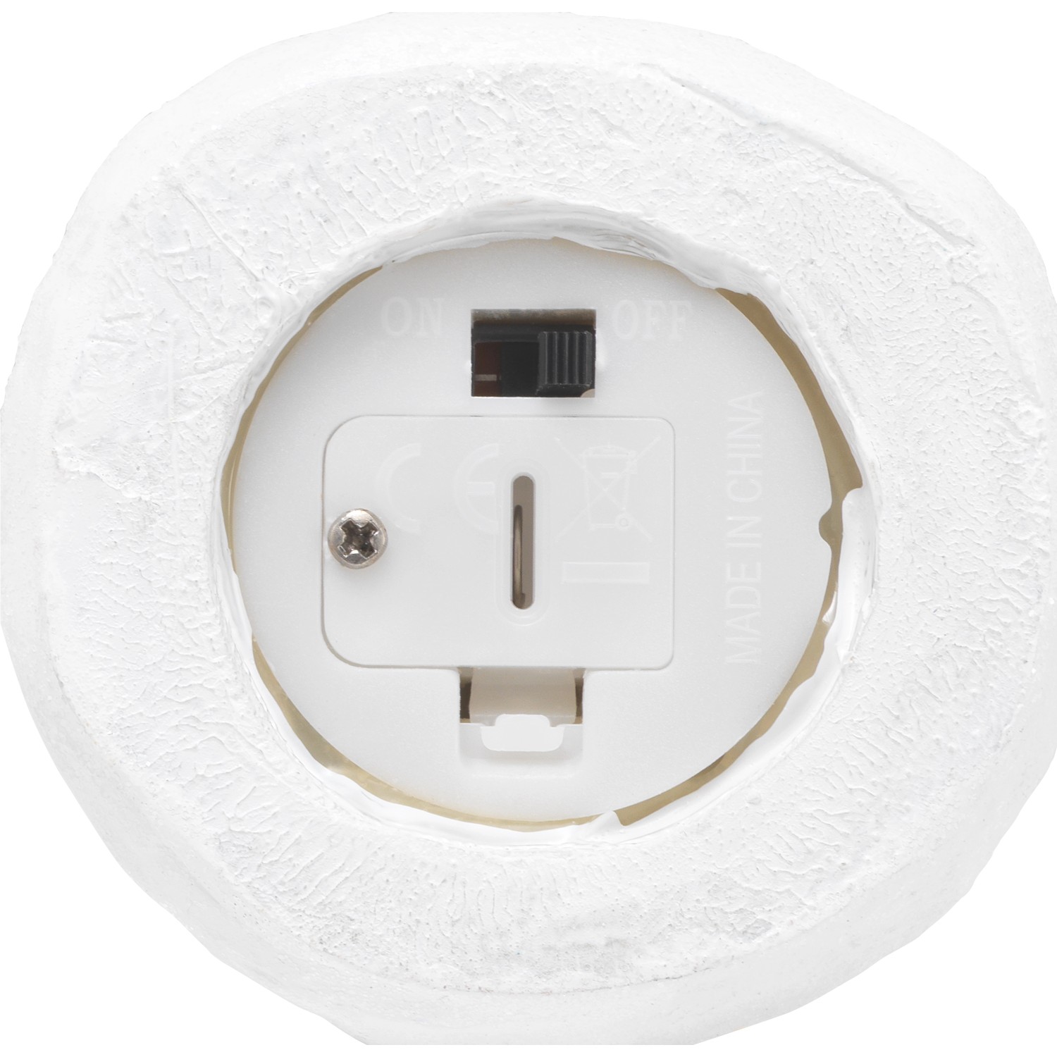 Detailansicht der Batterieabdeckung des beleuchteten Weihnachtshaus, Tischdeko.