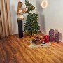 Aufbau eines künstlichen LED Weihnachtsbaums Nagano, 180 cm, grüne Kunsttanne.