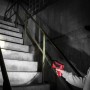 Eufab LED Handscheinwerfer 3W leuchtet Treppe aus, schwarz-rotes Gehäuse.
