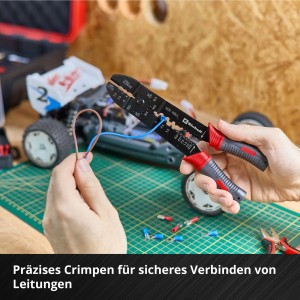 Einhell Werkzeugkoffer Hobby: Crimpzange im Einsatz mit Kabeln und Werkzeug auf Werkbank.