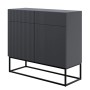Selsey Sideboard Veldio schwarz, geriffelte Front, 2 Schubladen, schlanke schwarze Metallbeine. Modernes Möbelstück.