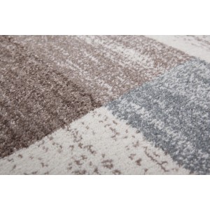 Detailansicht: Kayoom Teppich Falkland Port Louis in Pastellblau mit meliertem Patchwork-Design.