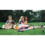 Lila Six Degrees Aluminium Scooter mit Luftbereifung, Klappmechanismus, im Park bei spielenden Kindern.