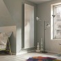 Weißer Ximax Raumheizkörper P1 Duplex (1500x520mm, 1162 Watt) im modernen Wohnraum.