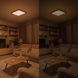 Philips Valen LED-Deckenleuchte, schwarz, 30 cm, zeigt WarmGlow-Licht in hell und gedimmt im Wohnzimmer.