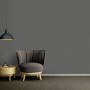 A.S. Création Vliestapete Uni in Schwarz-Grau an Wand mit Sessel und Lampe.