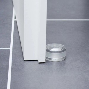 Transparenter Wagner Bodentürstopper (Ø 45 mm) schützt Tür und Boden.